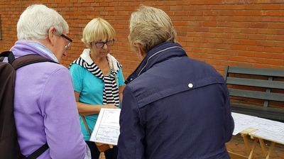 Cllrs Ackroyd and Lubbock speaking with a local resident at the Bank Holiday Monday street surgery