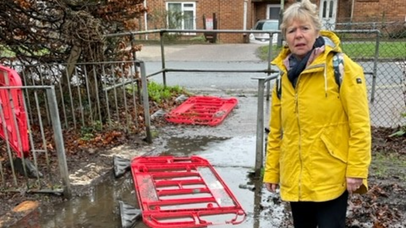 Cllr Judith Lubbock inspecting the flooding.