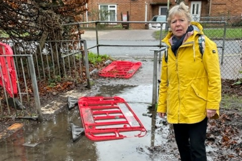 Cllr Judith Lubbock inspecting the flooding.