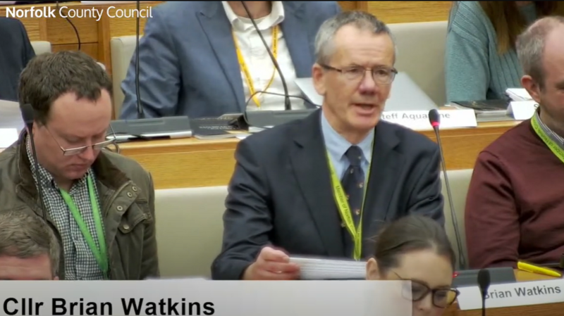 Cllr Brian Watkins talking at a full council meeting of Norfolk County Council in December 2023.